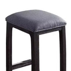 Sgabello da bar altezza bancone con seduta rivestita in lino e base in legno