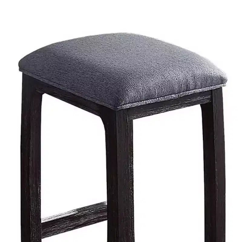 Sgabello da bar altezza bancone con seduta rivestita in lino e base in legno