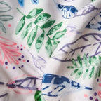 Pouf rotondo in tessuto con stampa a fiori e foglie - Bianco