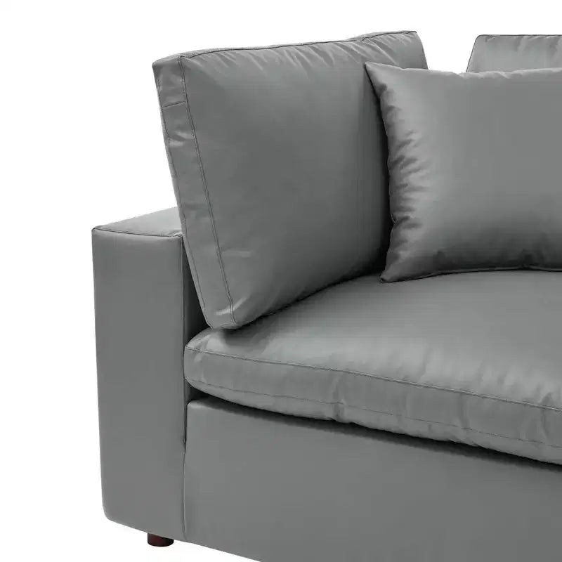 Poltrona angolare in similpelle extra imbottita in piuma